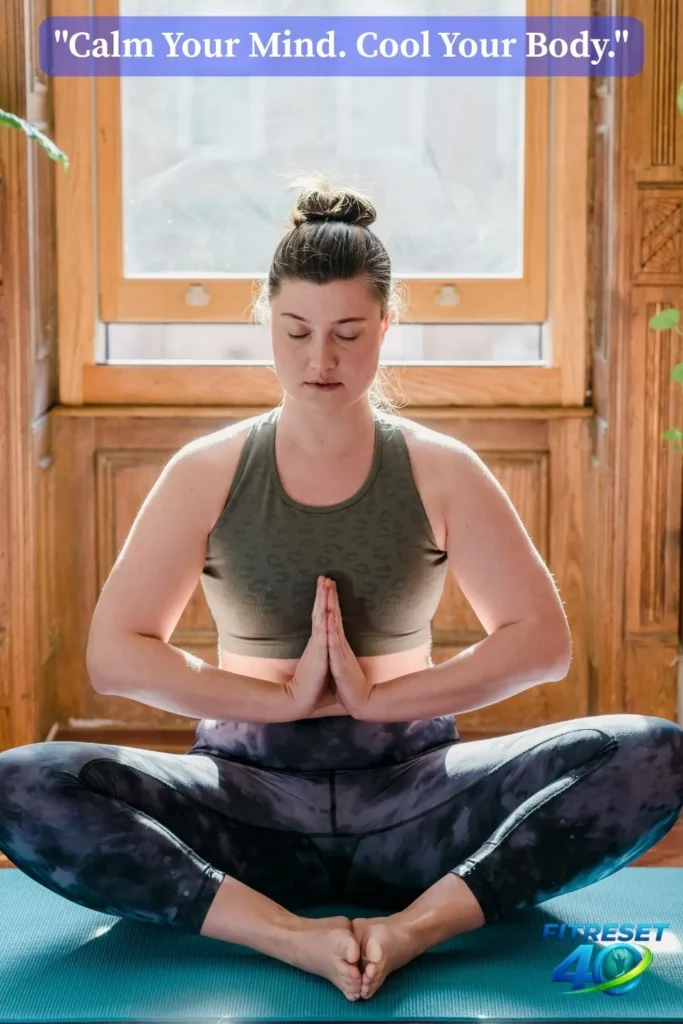 Woman meditating to manage menopause stress and hot flash symptoms naturally