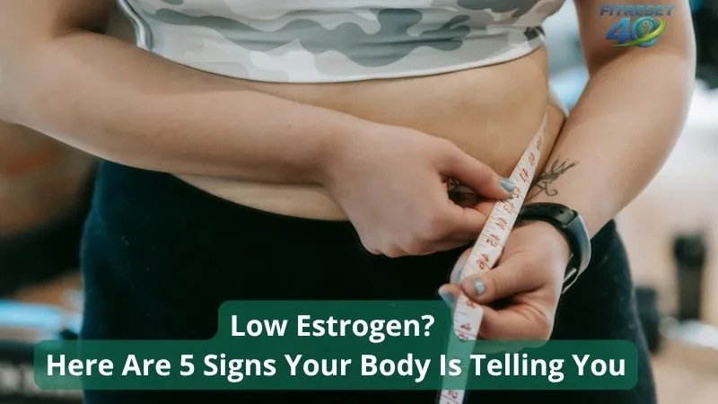 Estrogen Drop and Weight Gain After 40 - Signs and Symptoms woman over 40 concerned about belly fat caused by low estrogen
